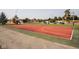 Outdoor basketball court with green and red surface at 4000 N Meridian St # 2H, Indianapolis, IN 46208