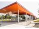 Modern community building with an orange roof and large glass windows at 4000 N Meridian St # 2H, Indianapolis, IN 46208