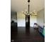 Dining room with hardwood floors and chandelier at 4000 N Meridian St # 2H, Indianapolis, IN 46208