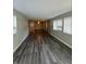 Sunlit living room with hardwood floors and window at 4000 N Meridian St # 2H, Indianapolis, IN 46208