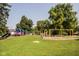 playground with swings and play structures at 4000 N Meridian St # 2H, Indianapolis, IN 46208