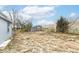 Backyard with shed and chain link fence at 4925 W Raymond St, Indianapolis, IN 46241