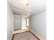 Simple bedroom with carpeted floor, closet, and window at 4925 W Raymond St, Indianapolis, IN 46241