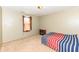 Small bedroom with carpet and electric fireplace at 4925 W Raymond St, Indianapolis, IN 46241
