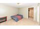 Bedroom with American flag bedding and closet at 4925 W Raymond St, Indianapolis, IN 46241