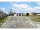 Ranch home with detached garage and driveway at 4925 W Raymond St, Indianapolis, IN 46241