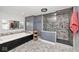 Bathroom with soaking tub and walk-in shower, tiled floors at 6348 Kingsley Dr, Indianapolis, IN 46220