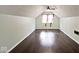 Large bedroom with dark hardwood floors and a ceiling fan at 6348 Kingsley Dr, Indianapolis, IN 46220