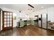 Updated kitchen with stainless steel appliances and green cabinets at 6348 Kingsley Dr, Indianapolis, IN 46220