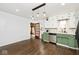Eat-in kitchen with stainless steel appliances and hardwood floors at 6348 Kingsley Dr, Indianapolis, IN 46220