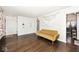 Living room featuring hardwood floors and a view into the kitchen at 6348 Kingsley Dr, Indianapolis, IN 46220