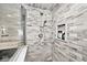 Large walk-in shower with tiled walls and dual shower heads at 6348 Kingsley Dr, Indianapolis, IN 46220