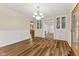 Dining room with hardwood floors and built-in cabinetry at 8026 Delbrook Dr, Indianapolis, IN 46260