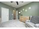 Well-lit Bedroom with ample closet space and a calming green color scheme at 8885 River Ridge Dr, Brownsburg, IN 46112