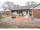 Brick patio with fire pit, offering a relaxing outdoor space at 965 W New Rd, Greenfield, IN 46140