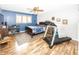 Spacious bedroom with hardwood floors and a home gym at 965 W New Rd, Greenfield, IN 46140