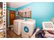 Laundry room with washer, dryer and storage at 965 W New Rd, Greenfield, IN 46140