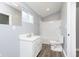 Clean bathroom with a shower/tub combo and white vanity at 209 Trowbridge St, Indianapolis, IN 46201