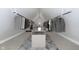 Spacious walk-in closet with ample hanging space and shelving at 209 Trowbridge St, Indianapolis, IN 46201