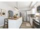 Spacious kitchen island with wood countertop and stainless steel appliances at 209 Trowbridge St, Indianapolis, IN 46201