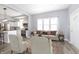 Open concept living room and kitchen with modern furnishings at 209 Trowbridge St, Indianapolis, IN 46201