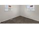 Spacious bedroom with neutral walls and carpet flooring at 3125 N Tacoma Ave, Indianapolis, IN 46218