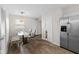 Bright dining area with glass table and bench seating at 3125 N Tacoma Ave, Indianapolis, IN 46218