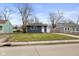 Newly painted bungalow with a spacious yard and driveway at 3125 N Tacoma Ave, Indianapolis, IN 46218