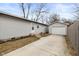 Rear view showing a house, detached garage, and driveway at 3125 N Tacoma Ave, Indianapolis, IN 46218