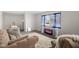 Living room with comfy seating and a fireplace at 3125 N Tacoma Ave, Indianapolis, IN 46218