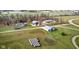 Aerial view of the house, barn, outbuildings, and fields at 432 500 N, Anderson, IN 46012
