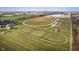 Aerial view of property with horse track, outbuildings, and fields at 432 500 N, Anderson, IN 46012