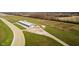 Aerial photo of a barn on a rural property with fenced areas at 432 500 N, Anderson, IN 46012