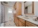 Bathroom with vanity, toilet, shower, and ample storage at 432 500 N, Anderson, IN 46012