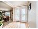 Bright entryway with double doors featuring decorative glass and hardwood floors at 432 500 N, Anderson, IN 46012