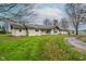 Charming ranch-style home with a large yard and attached garage at 432 500 N, Anderson, IN 46012