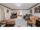 Living room featuring ample seating, entertainment center, and access to other living spaces at 432 500 N, Anderson, IN 46012
