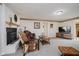 Cozy living room with fireplace, comfortable seating, and entertainment center at 432 500 N, Anderson, IN 46012