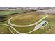 An aerial view of a horse racing track and barn on a large property at 432 500 N, Anderson, IN 46012