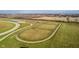 Aerial view of multiple horse tracks with a barn at 432 500 N, Anderson, IN 46012