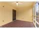 Cozy screened porch with brick floor and wrought iron door at 4529 Dickson Rd, Indianapolis, IN 46226