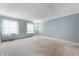Empty bedroom with light blue walls and carpeted floors at 4832 E 200 N, Anderson, IN 46012