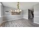 Dining room with light gray walls and wood-look flooring at 4832 E 200 N, Anderson, IN 46012