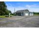Large, multi-car garage with attached workshop and ample parking space at 4832 E 200 N, Anderson, IN 46012