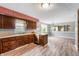 Spacious kitchen with wood cabinets and view of the dining area at 4832 E 200 N, Anderson, IN 46012