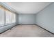 Spacious living room with large windows and neutral decor at 4832 E 200 N, Anderson, IN 46012