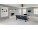 Living room featuring a brick fireplace and built-in shelving at 4832 E 200 N, Anderson, IN 46012