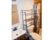 Simple bathroom with white vanity and tiled shower at 7021 Bellsville Pike, Columbus, IN 47201