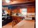 Functional kitchen with wood cabinets and appliances at 7021 Bellsville Pike, Columbus, IN 47201