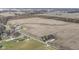 Aerial view of farmland, houses, and a road, showing a mix of rural and residential areas at 10873 N County Road 800 E, Brownsburg, IN 46112